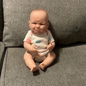 Realistic Baby Doll with Polka Dot Outfit